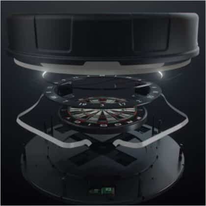 Exploded view of a high-tech casino game device with a glowing circular roulette/dartboard component lifted above its base.