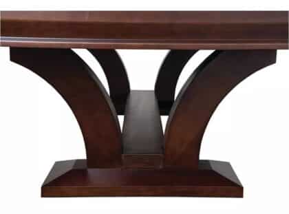 Dark wood dining table base with two curved arches forming supports and a central beam on a rectangular plinth.