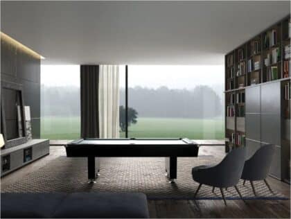 Sleek contemporary living room with a pool/billiards table, floor-to-ceiling window, and bookshelves along the right wall.