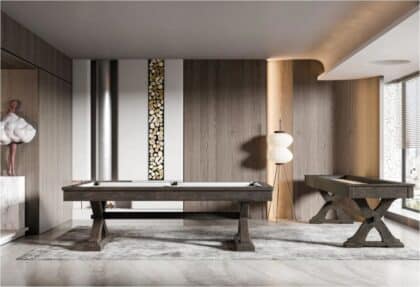 Contemporary game room with a dark wood pool table on a light rug, wood-paneled walls, and a floor lamp.